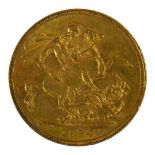 A VICTORIAN 22CT GOLD SOVEREIGN COIN, DATED 1884 With Young Queen Victoria bust and George and