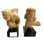 TWO 3RD/4TH CENTURY GANDHARA, HADDA STUCCO HEADS OF MUSICIANS Holding a drum and the other holding a