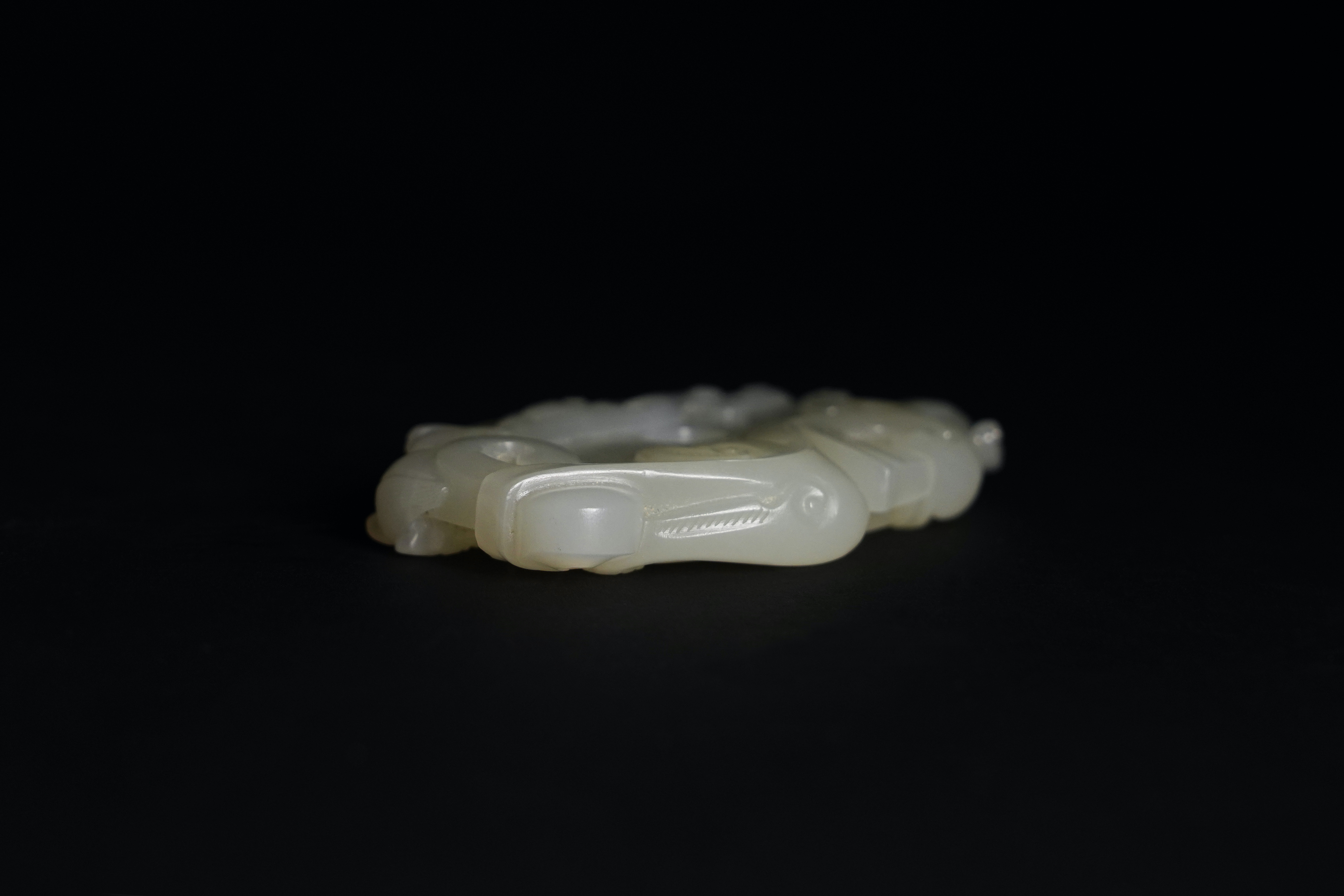 A White Jade Bi Disc Pendant, Qianlong L:6.5cm the oval disc finely carved with archaistic 'c' - Image 5 of 6