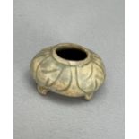A Miniature Yue Celadon Four Legged Pot, Song dynasty W:4.5cm of low oval form, standing on four tab