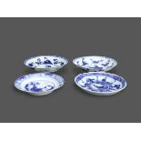 Four Blue and White Saucers, Kangxi the pair W:12.5cm including a pair with lange lijsen around a