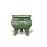 A Longquan Celadon Tripod Censer, Liding, Ming dynasty H:13cm carved in low relief , beneath the sea