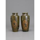 A Pair of mixed metal Japanese Vases, Meiji period H: 12cm well decorated on one side with a peony