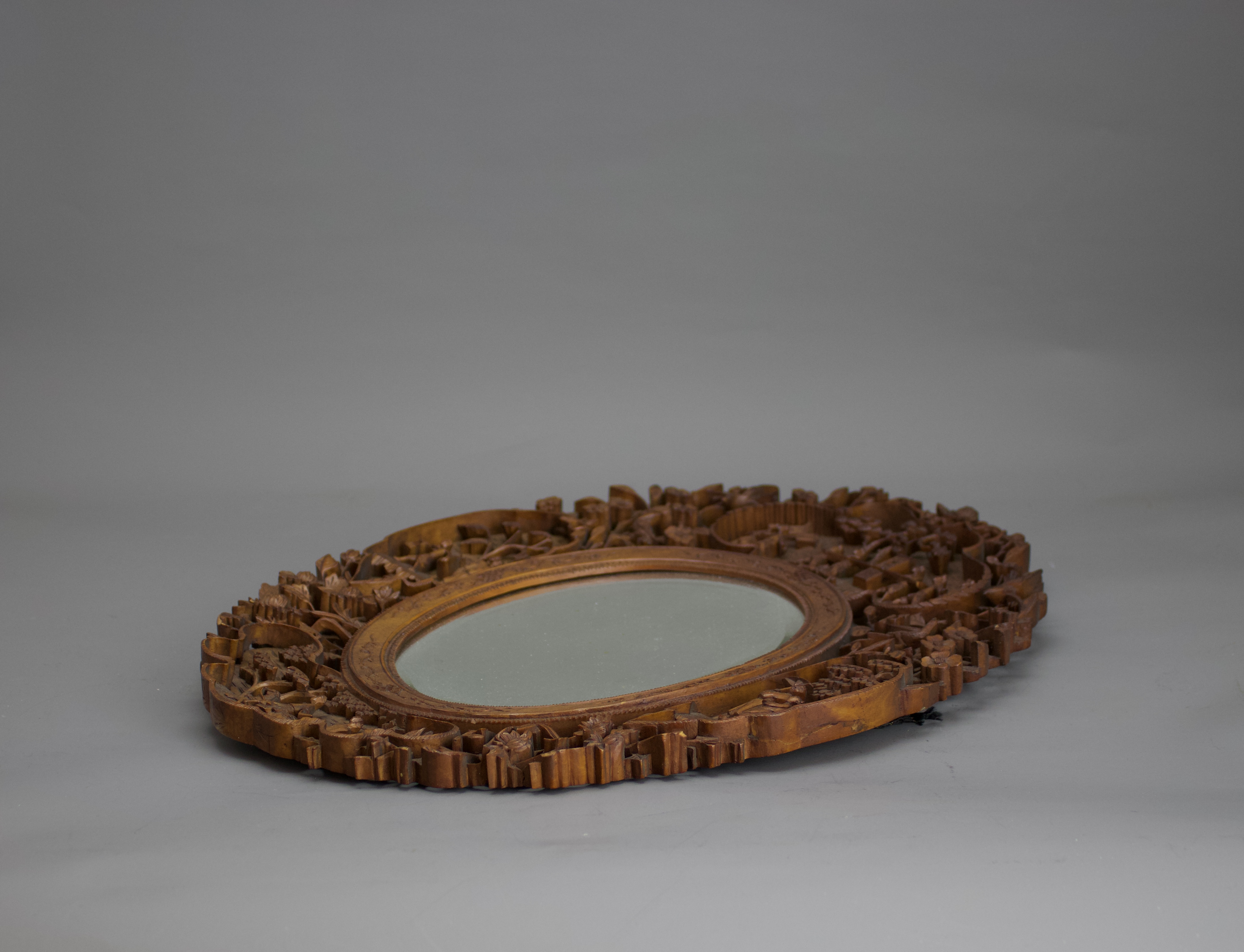 A carved fruitwood Mirror Frame, 19th century H: 38cm of shaped oval form, well carved with four - Bild 5 aus 5