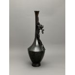 A Japanese Bronze 'Iris' Vase, Meiji period H:35.5cm the elegant tall bottle vase of hexagonal