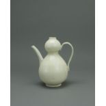 A Ding type Double Gourd Ewer, probably Northern Song H:15cm of elegant slender form, with pear