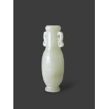 A Celadon Jade Vase, Qing dynasty H:10cm of tall elongated bottle form and flattened quadrilobed