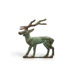 An Ordos Bronze Deer Plaque, probably Han H:9cm, excluding mount the stag standing on a line base,