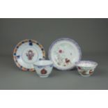 A Chinese Imari Cup, and a Saucer, and a 'famille rose' Cup and Saucer, 18th century One cup in good