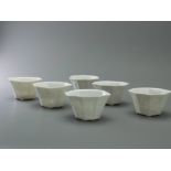 Six Rare Dehua 'Eight Immortals' Winecups, Kangxi W:7.5cm each of compressed octagonal section,