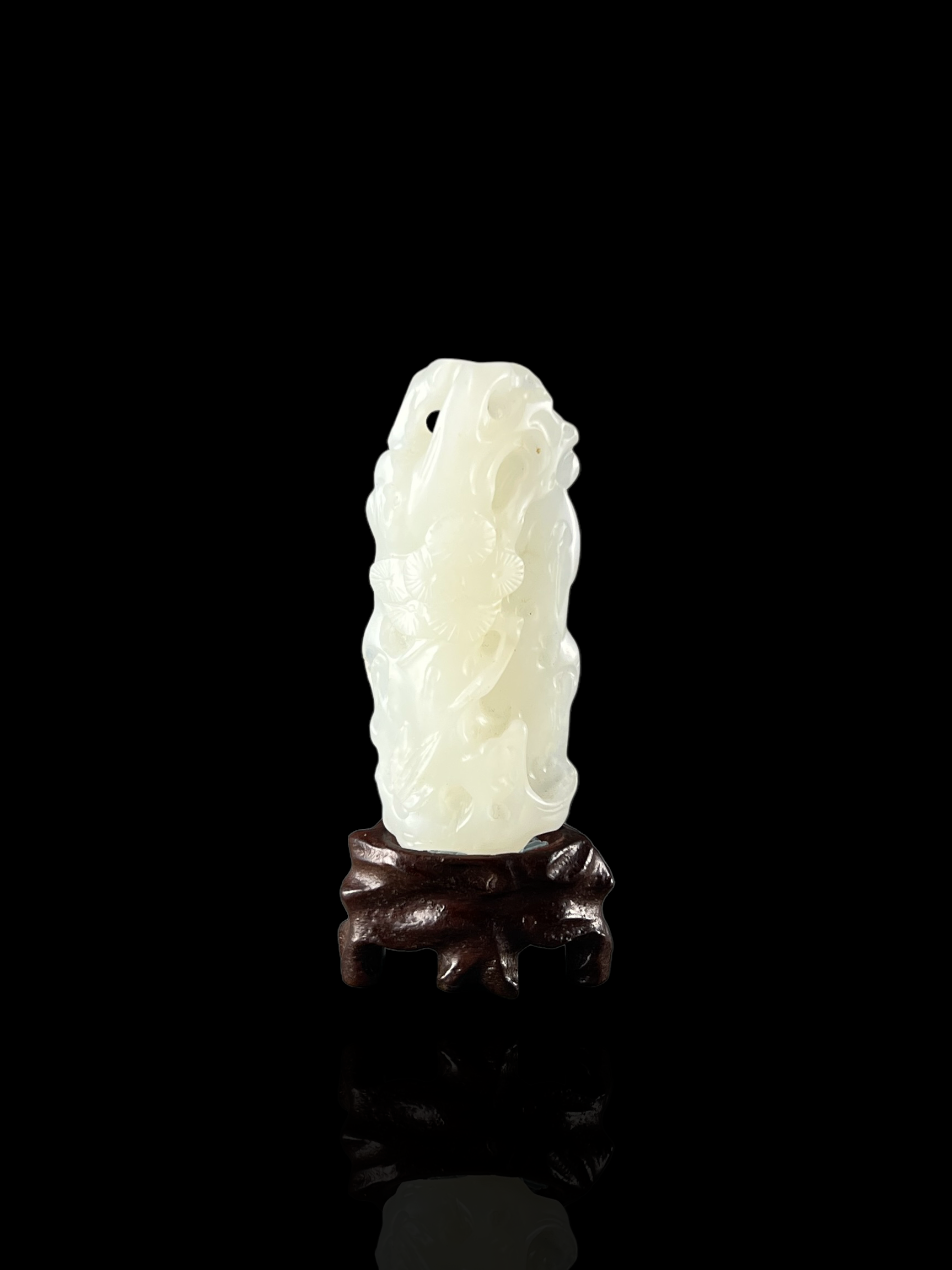 A White Jade 'Ancient Pine' Pendant, Qianlong H:6.5cm finely carved in high and pierced relief ,with