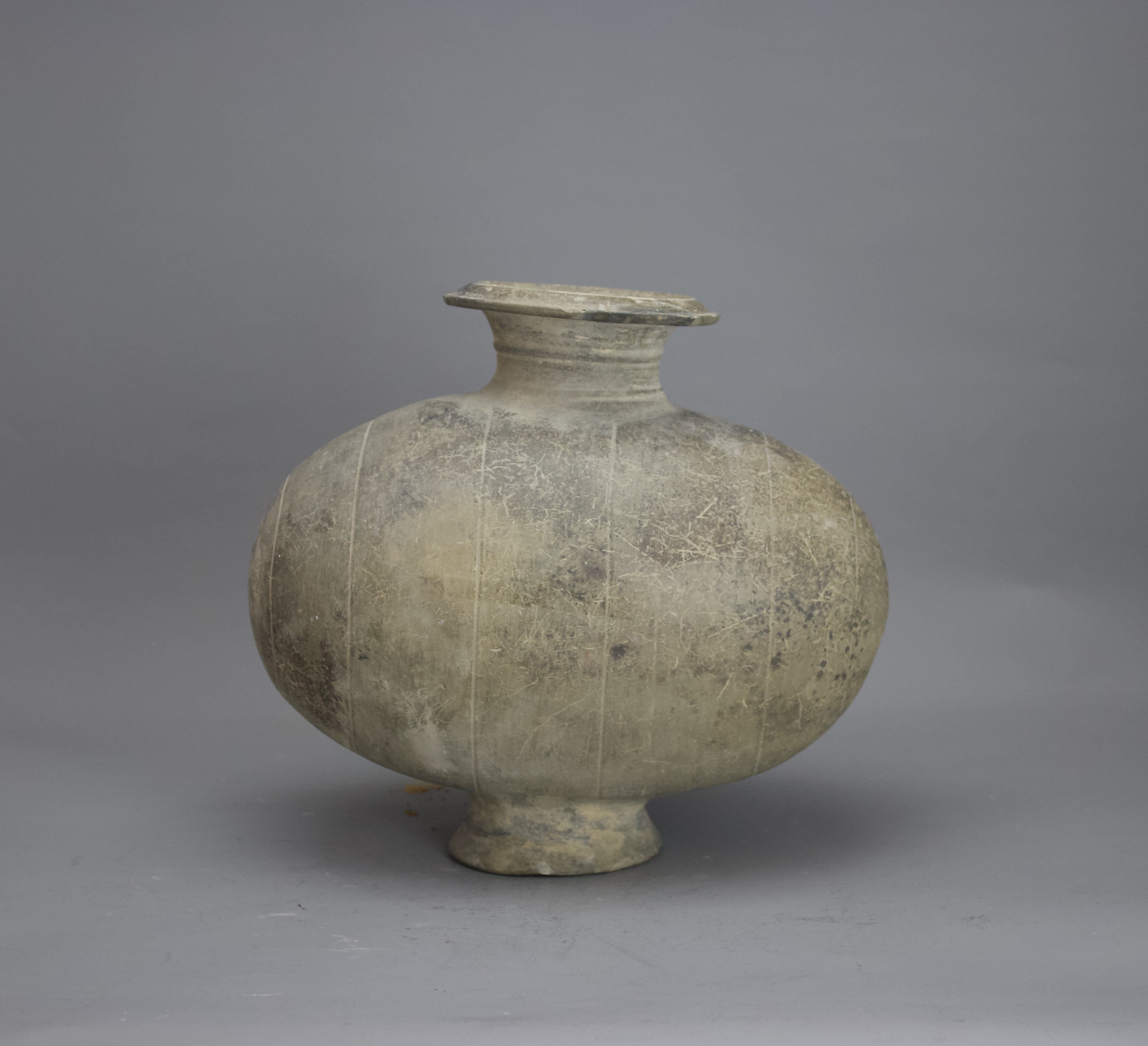 A grey pottery Cocoon Vase, Han dynasty, BC 206 - AD220L: 29 cms H: 25 cms PROPERTY FROM THE COLIN