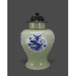 A Celadon Ground Blue and White Jar, Kangxi H:41cm. overall the baluster sides with four blue and