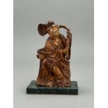 A Boxwood Maiden Immortal, 18th/19th Century H:12.8cm overall Well carved, with the beautiful maiden