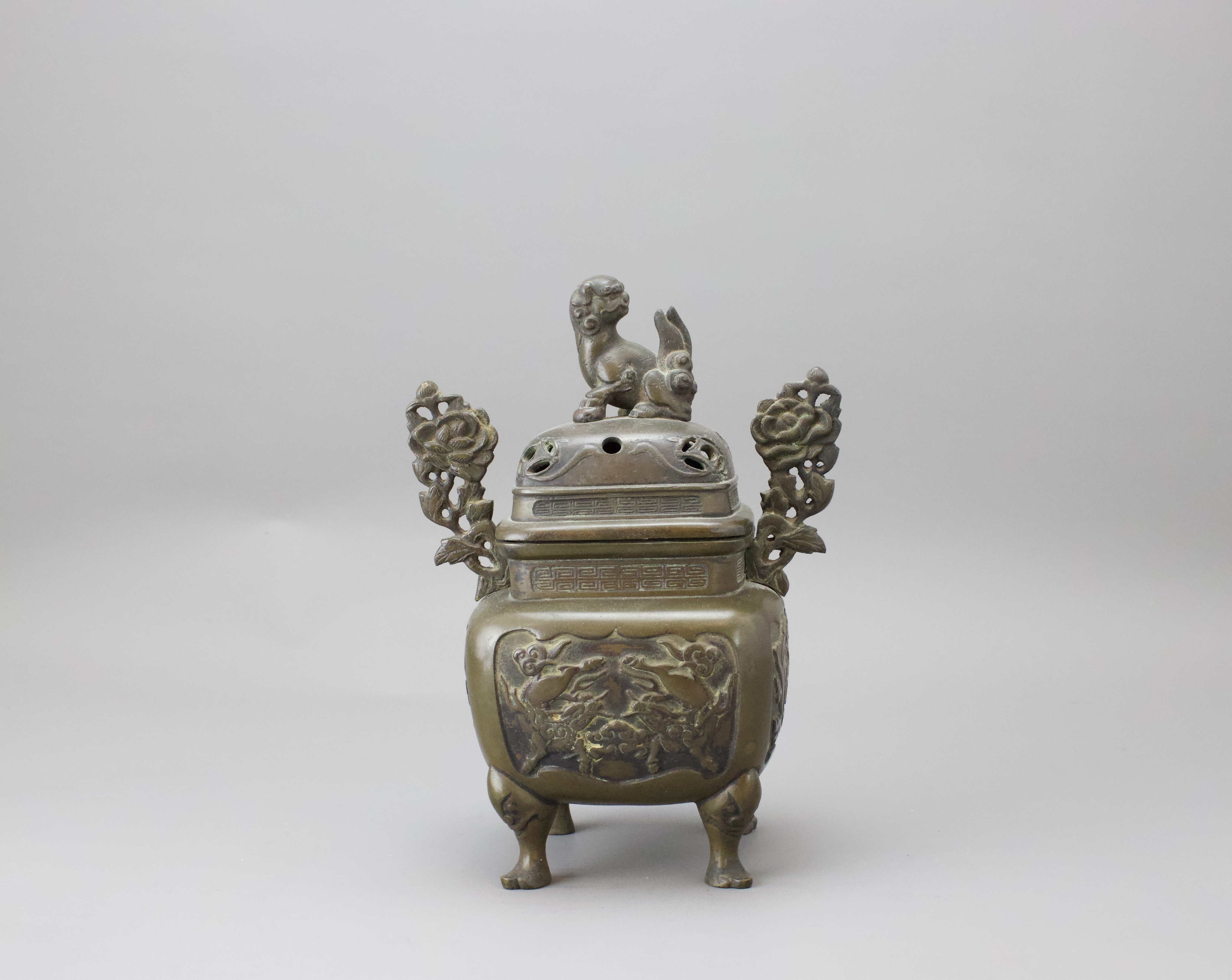 A Japanese Bronze Censer and Cover, Meiji period H:21cm Of square section, standing on four baluster