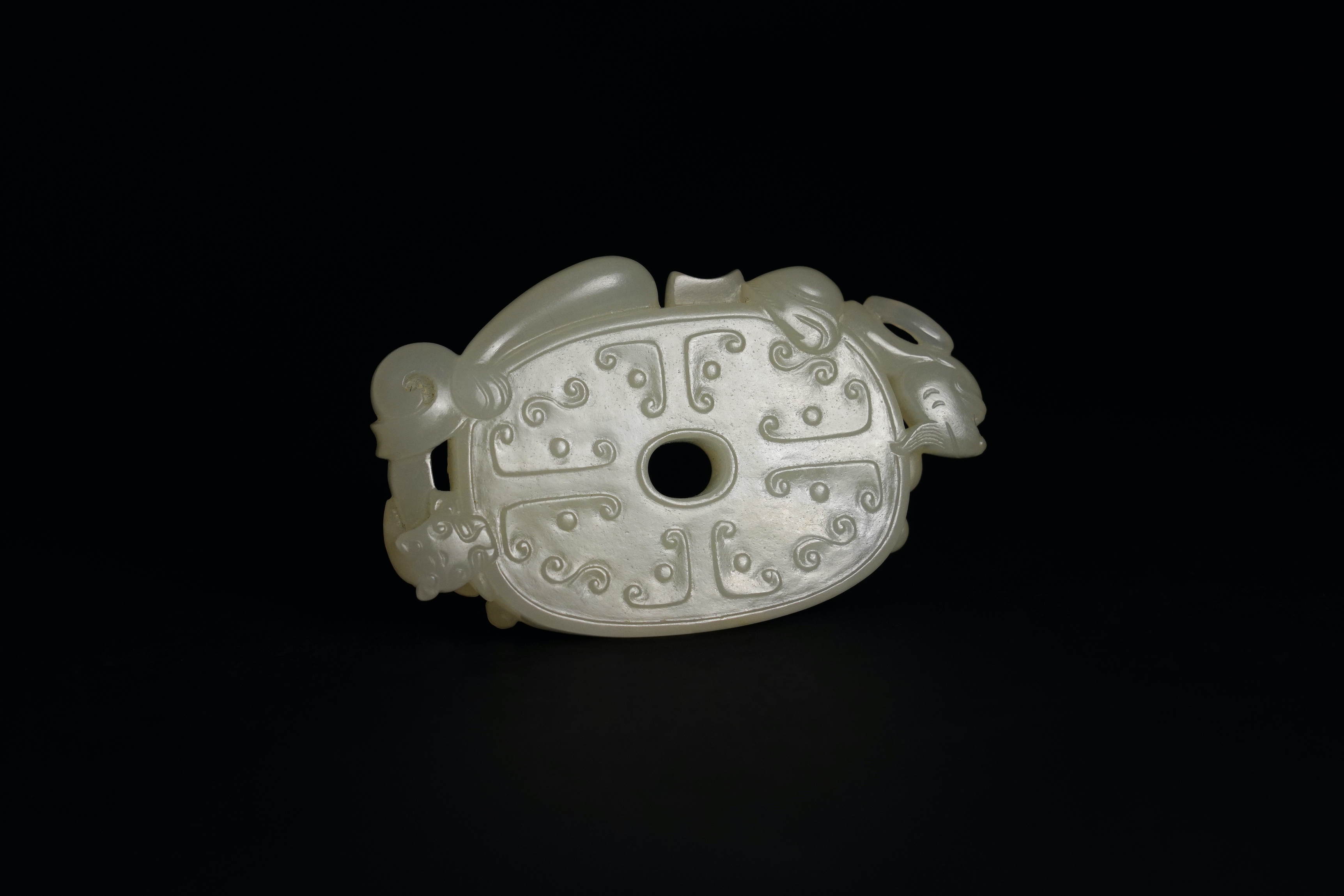 A White Jade Bi Disc Pendant, Qianlong L:6.5cm the oval disc finely carved with archaistic 'c' - Image 3 of 6