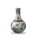 A 'famille verte ' Bottle Vase, Kangxi H:26cm of fluted globular form with straight neck, knopped