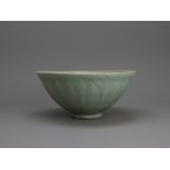 A Longquan Celadon Lotus Bowl, Song/Yuan dynasty W:19.7cm carved to the exterior with lotus petals ,