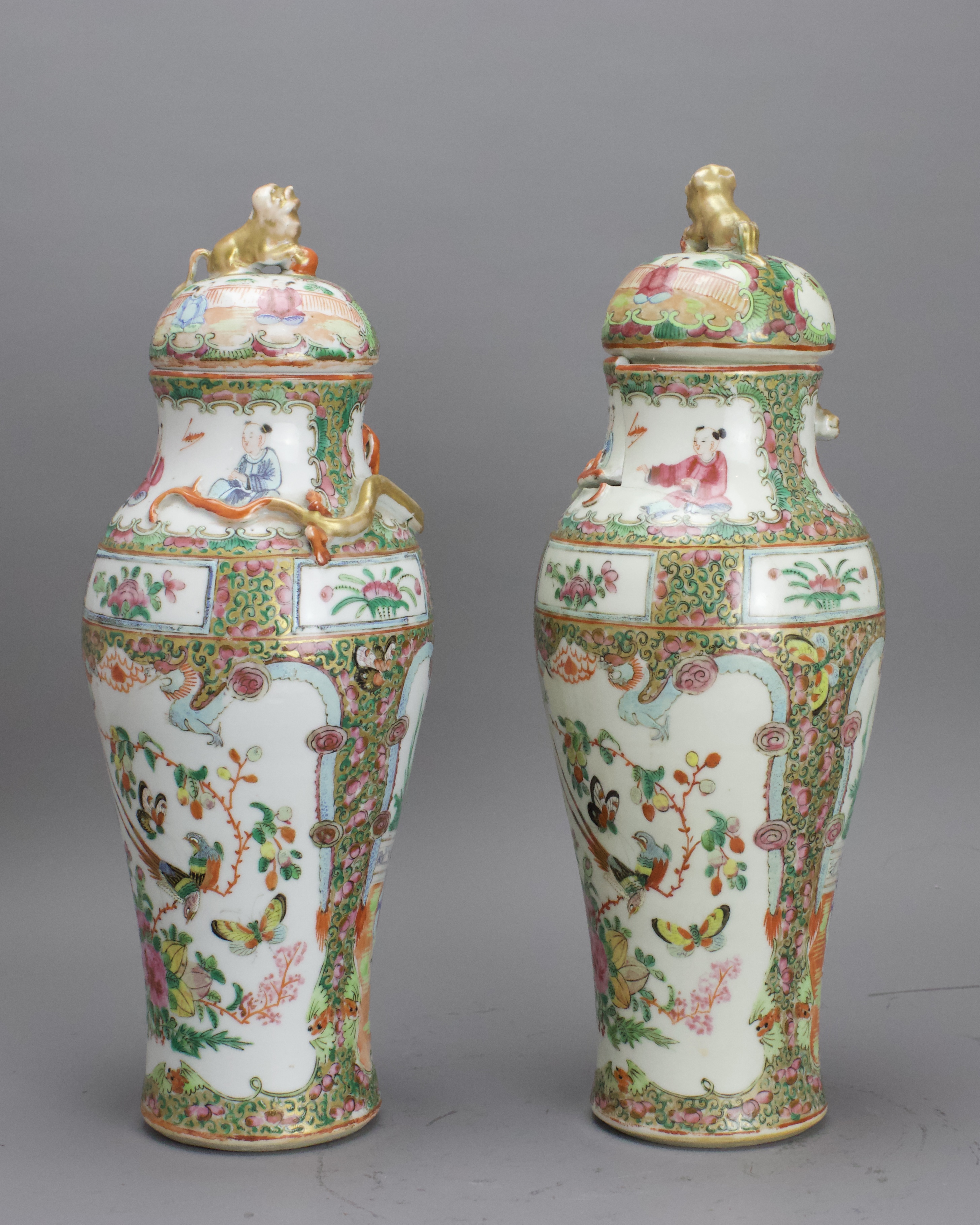 A Pair of Canton 'famille rose' Vases and Covers, Late Qing H: 30cm.overall of baluster form,