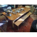 AN LARGE EARLY 20TH CENTURY RUSTIC PINE FARMHOUSE TABLE With plank top on turned legs, along with