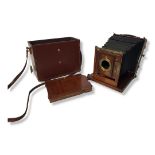 HALF PLATE LARGE FORMAT VIEW CAMERA. 1886-1887 Keyhole type mount for front standard. Bottom