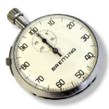 BREITLING, A VINTAGE CHROME STOPWATCH Having a subsidiary dial and 1-100 seconds markings, bearing