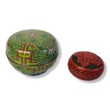 A VINTAGE CHINESE CLOISONNÉ SPHERICAL TRINKET BOX AND COVER With fine decoration on a green