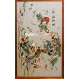 A CHINESE EMBROIDERED SILK PANEL Exotic birds, framed and glazed. (46cm x 76cm) Condition: good