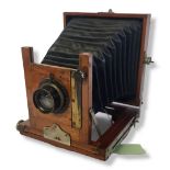 W. BUTCHER WOODEN PLATE CAMERA Coronet No.1 Quarter Plate camera with lens. Double extension