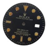 ROLEX, SEA-DWELLER, BLACK TONE WATCH DIAL Having luminous number markings and calendar window,