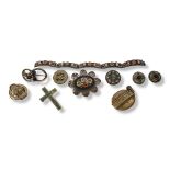 A VICTORIAN PINCHBECK OVAL LOCKET Set with three paste stones,together with a crucifix set with