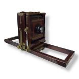 HALF PLATE WOODEN KODAK VIEW CAMERA. Ground glass intact, leather handle, Dallmeyer Serrac lens,