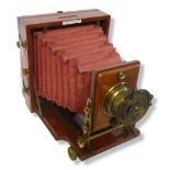 LANCASTER PATENT INSTANTOGRAPH HALF PLATE WOODEN BELLOWS CAMERA. Early model, split in front of