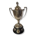 A LARGE VICTORIAN SILVER CYCLING PRESENTATION TROPHY CUP AND COVER Having an acorn finial and twin
