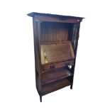 IN THE MANNER OF LIBERTY & CO., AN ARTS & CRAFTS PERIOD AND DESIGN OAK BUREAU/BOOKCASE. (95cm x 36cm