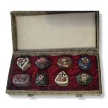 A VINTAGE SET OF EIGHT MINIATURE CHINESE CLOISONNÉ BOXES Various designs, in a fitted velvet lined