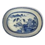 A FINE 18TH CENTURY CHINESE EXPORT PORCELAIN OVAL BLUE AND WHITE DISH In early willow pattern, Circa