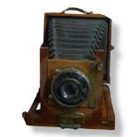 W BUTCHER CORONET No.1 c1913-19. A 4x3inch wooden bellows camera, Rodenstock Trimar 10.5cm in Compur