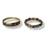 A VINTAGE 9CT GOLD AND SAPPHIRE HALF ETERNITY RING The row of round cut stones in a pierced