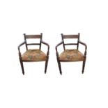 A PAIR OF COLONIAL ROSEWOOD OPEN ARMCHAIRS With scroll and bar backs, melon section posts and