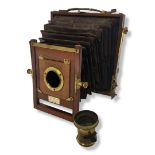 W. WATSON AND SONS ACME LARGE FORMAT WOODEN BELLOWS CAMERA. Half plate, burgundy bellows with square