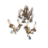 A SMALL BRASS AND CRYSTAL HUNG FIVE BRANCH CHANDELIER along with a pair of wall sconces. (27cm x