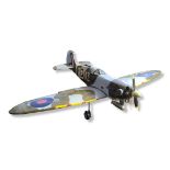 D'AGOSTINI, A 20TH CENTURY REMOTE CONTROL MODEL SPITFIRE AIRPLANE Having a stainless steel fuel