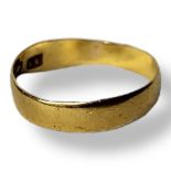 AN EARLY 20TH CENTURY 22CT GOLD WEDDING RING. (size L) Condition: slight wear