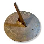 A LATE 18TH/EARLY 19TH CENTURY BRONZE SUNDIAL Circular form, with engraved Roman number markings and