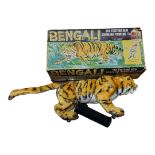 BENGALI GROWLING TIGER, A VINTAGE REMOTE CONTROLLED TOY Boxed, along with a clockwork monkey and