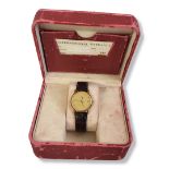 OMEGA, DE VILLE, A VINTAGE 18CT GOLD GENT’S WRISTWATCH Ultra thin case with gold tone dial and