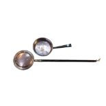 A 19TH CENTURY COPPER WARMING PAN AND SAUCEPAN Having a turned wooden handle.