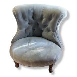 A VICTORIAN BUTTON BACK NURSING CHAIR Pale blue velvet upholstery, on turned legs with castors. (