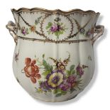 DRESDEN, A LATE 19TH/EARLY 20TH CENTURY HARD PASTE PORCELAIN JARDINIÈRE Twin handled, modelled in